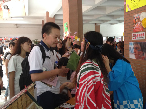 我校学生应邀参加中大趣味 “桃太郎祭”日本文化活动