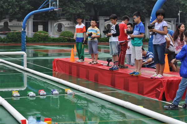 风雨无阻 少年赛车模 ——2015年全国青少年车辆模型锦标赛广州预选赛 暨广州市青少年车辆模型锦标赛成功举行